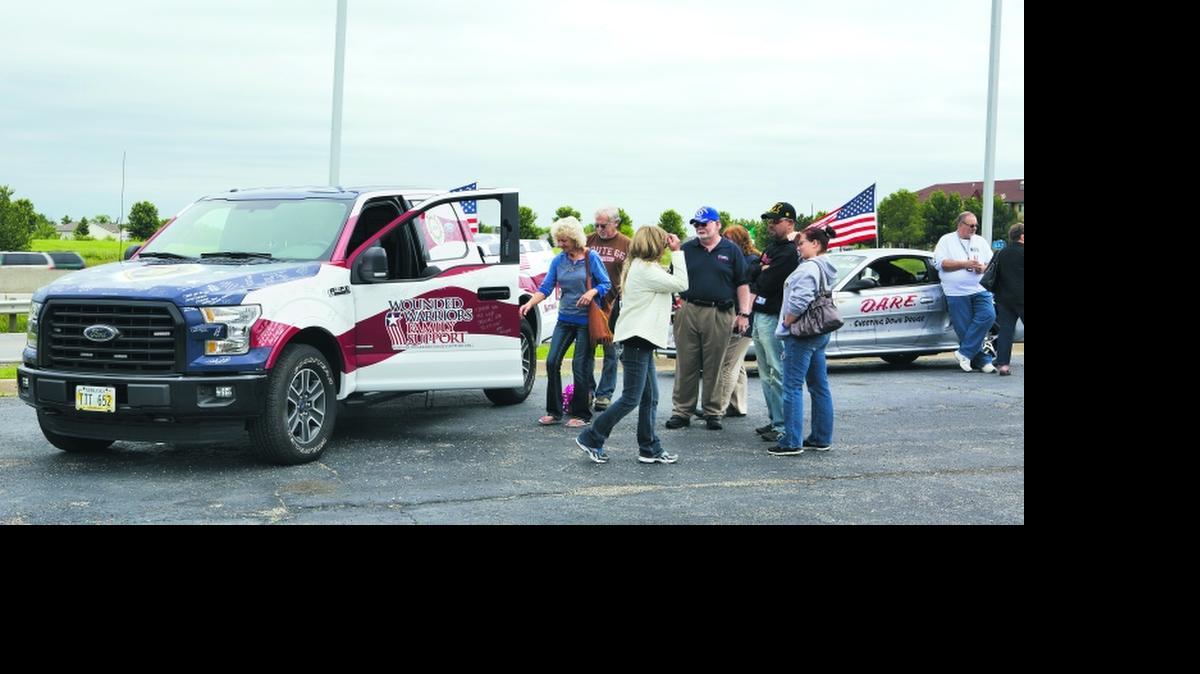
The High Five Tour, which allows the public to express their thanks to veterans and donate money to help purchase mobility-equipped vehicles for wounded veterans, stopped at Blue Springs Ford on May 23. Many took a look at the specially equipped Ford F-150
