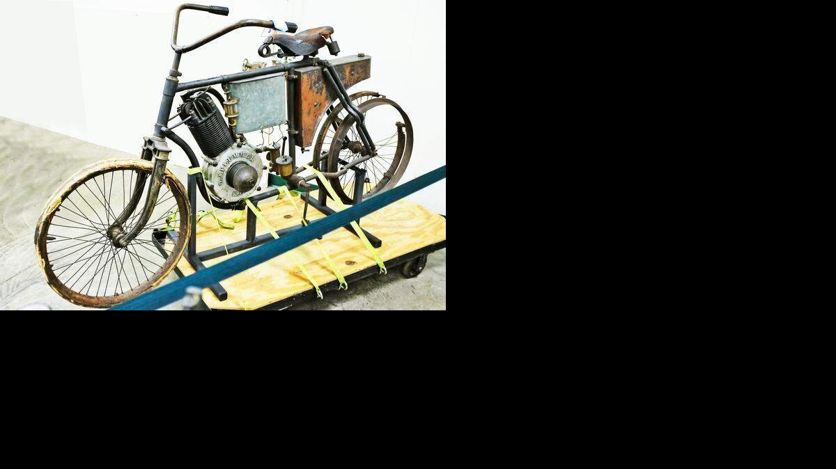 
The unrestored Plummer motorcycle is about 115 years old. 
