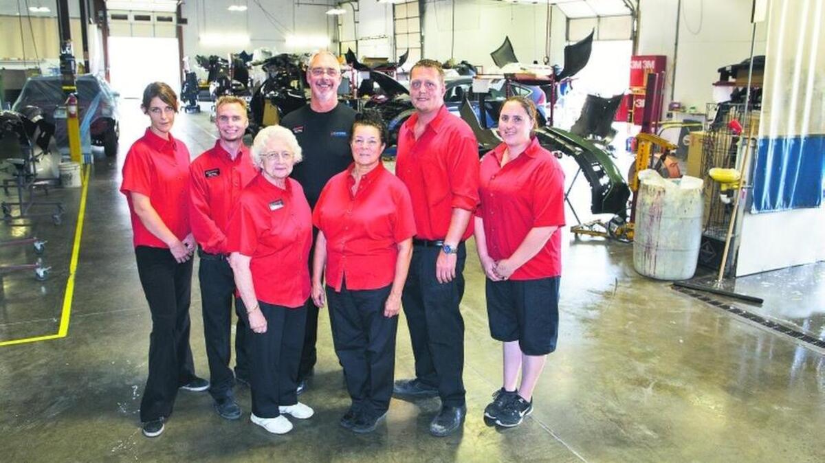 
Staff members of Wicklund's CARSTAR, from left to right: Kristin Wicklund, receptionist; Billy Wicklund, production manager; Rochelle Wicklund, secretary; Gerald Wicklund, president/owner; Beverly Robbins, accountant; Jason Wicklund, estimator; Kerri Dunn, parts manager. They were photographed in Wicklund’s CARSTAR facility.
