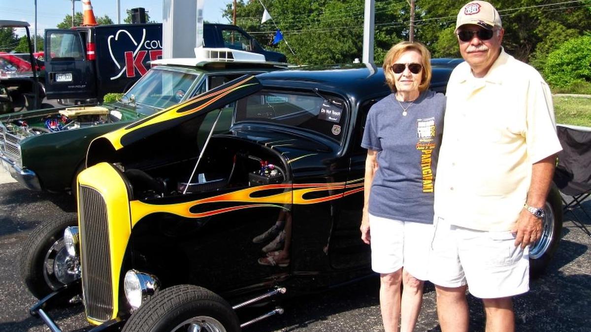 
Sue and John Gratton in front of their 1932 Ford.
