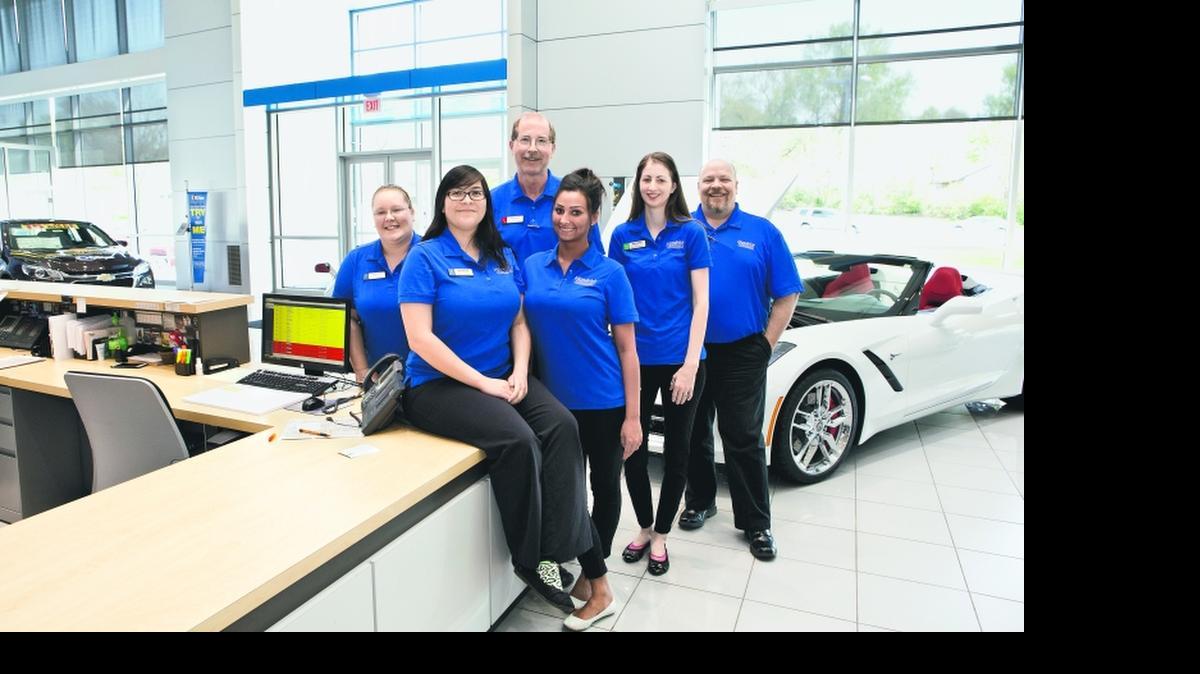 
Customer service at an auto dealership often begins with those who greet the customers first, either in person or by phone. Some of the guest services staff at Hendrick Chevrolet in Merriam are, from left to right: Kari Gonzales, Mindy Arriaga, Liana Zapien and Brooke Jones. Behind them are Mike McGinley, General Manager, and Marvin Johnson, Guest Services Manager. 
