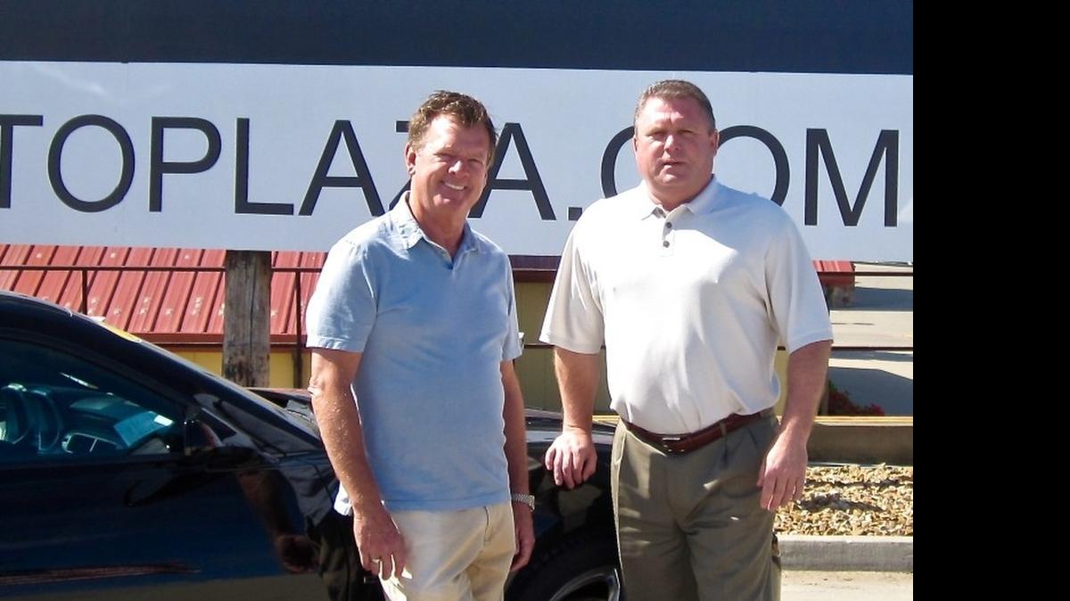 
Owner Randy Curnow, left, and Doug Milner, the general sales manager, of Randy Curnow Auto Plaza in Liberty.
