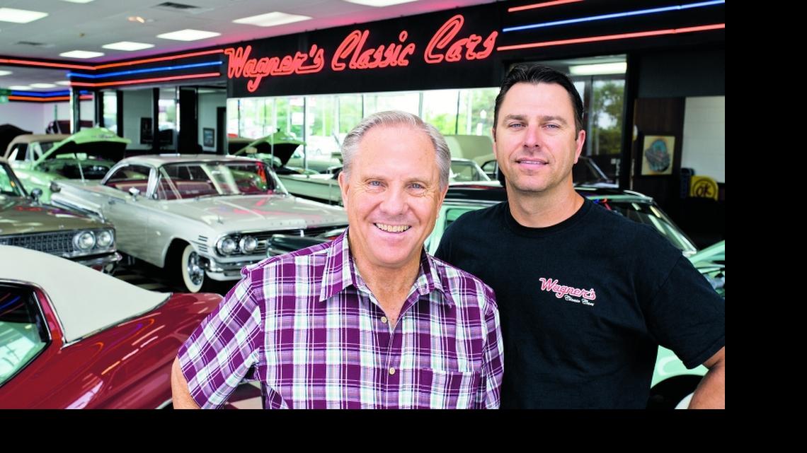 
Willie (left) and Scott Wagner in the showroom of Wagner's Classic Cars in Bonner Springs. 

