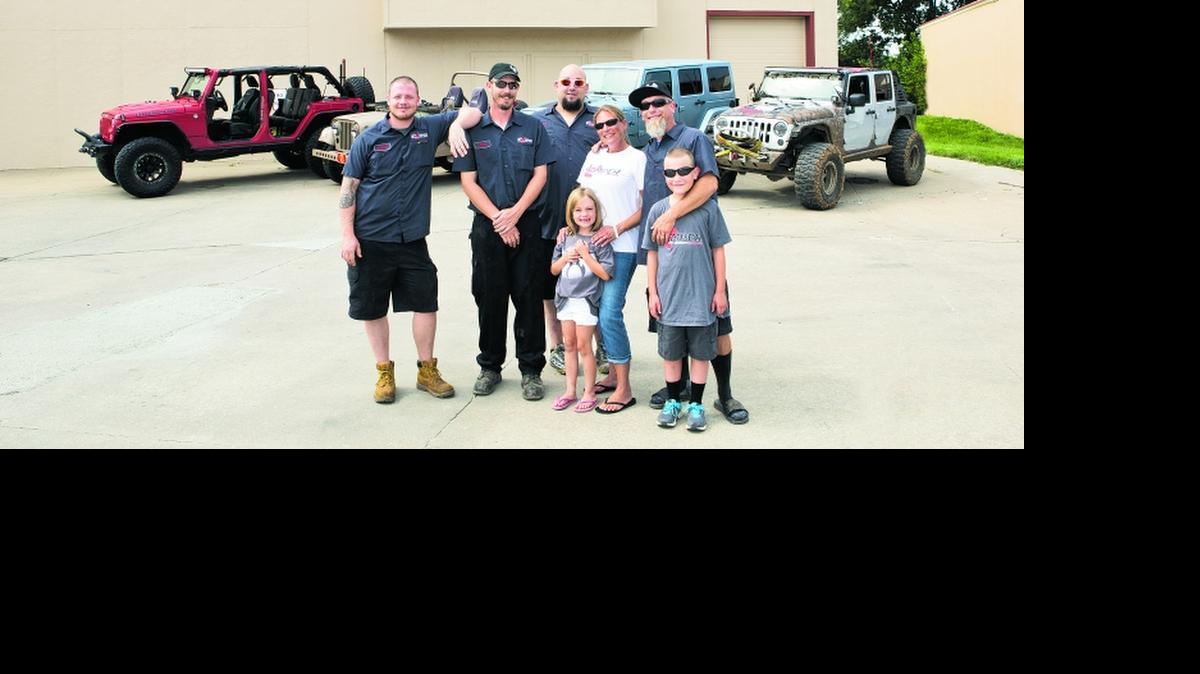 
Jay Blazier talked about owning his own Jeep shop, and now he does in Olathe: Stomper Off-Road. His Stomper Off-Road family includes, from left in back row, Jonathan Jamison, Chris Canary and Cristian Petersen, and his real-life family, in front row from left: Bailey Blazier, Ryan Blazier, Melissa Blazier and Jay Blazier.
