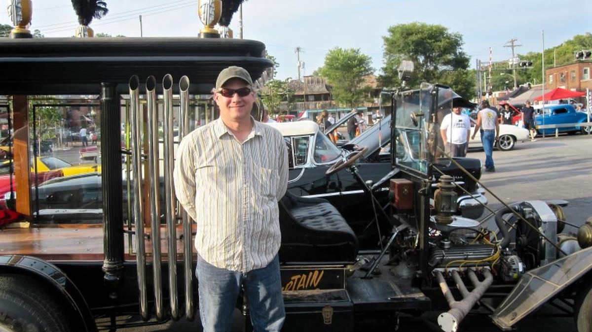 
Chris Wedd and his 1912 Model T Hearse. 

