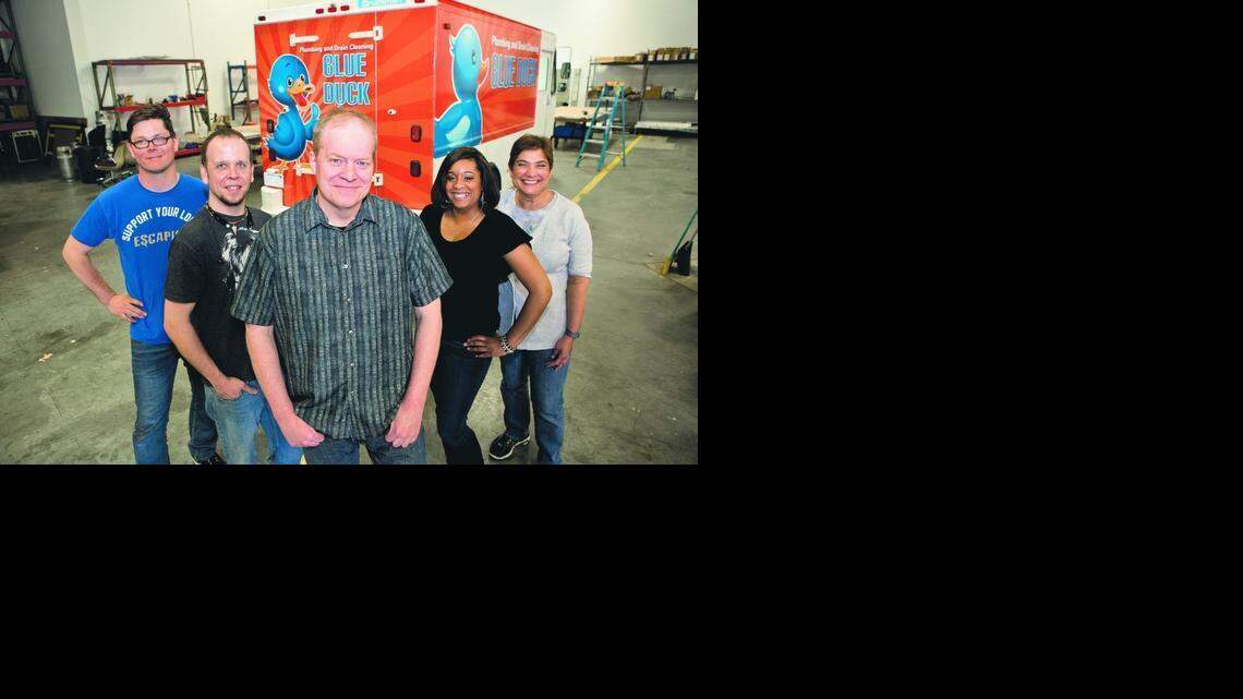 
Unchained Creative staff members, from left: Nate Taylor, Tony Mickelletto, owner Kevin Simms, Janelle Gatson, Pat Carlton
