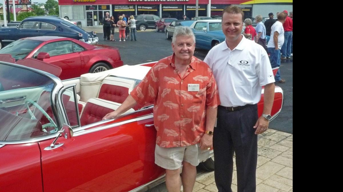 
Gary Sailor, left, and Dan Boyer, general manager of Cable-Dahmer Buick GMC Cadillac, at the Cadillac Club of Kansas City show on May 9
