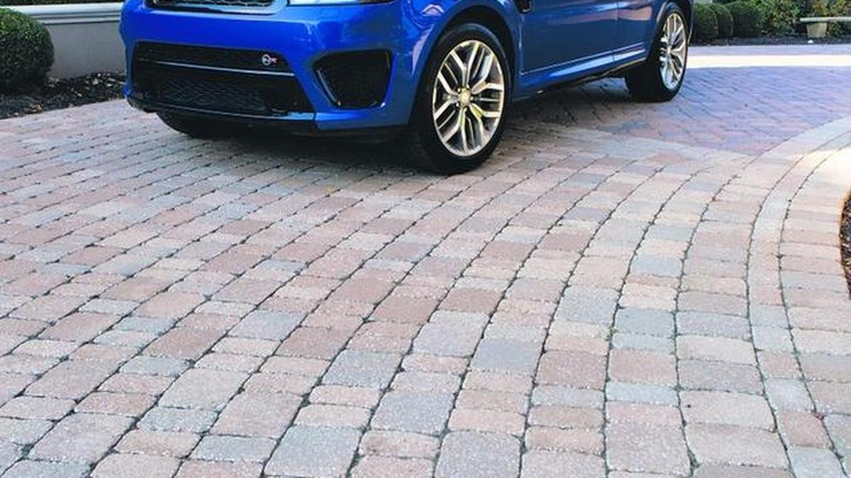 2015 Land Rover Range Rover Sport SVR. Photograph taken at Don & Linda Julian residence at Riss Lake.