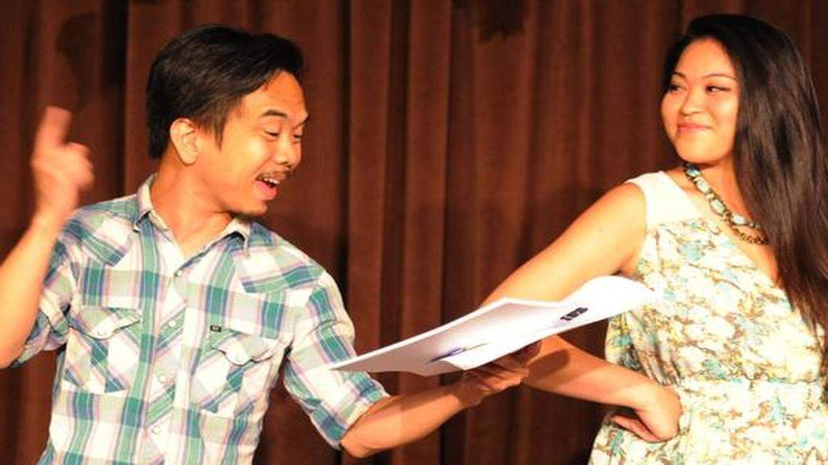 
Kansas City actor and songwriter Vi Tran hopes every family will relate to the theater piece he’s staging at the Buffalo Room. Tran (left) rehearsed “The Butcher’s Son” with actress Ai Vy Bui, who plays his mother.
