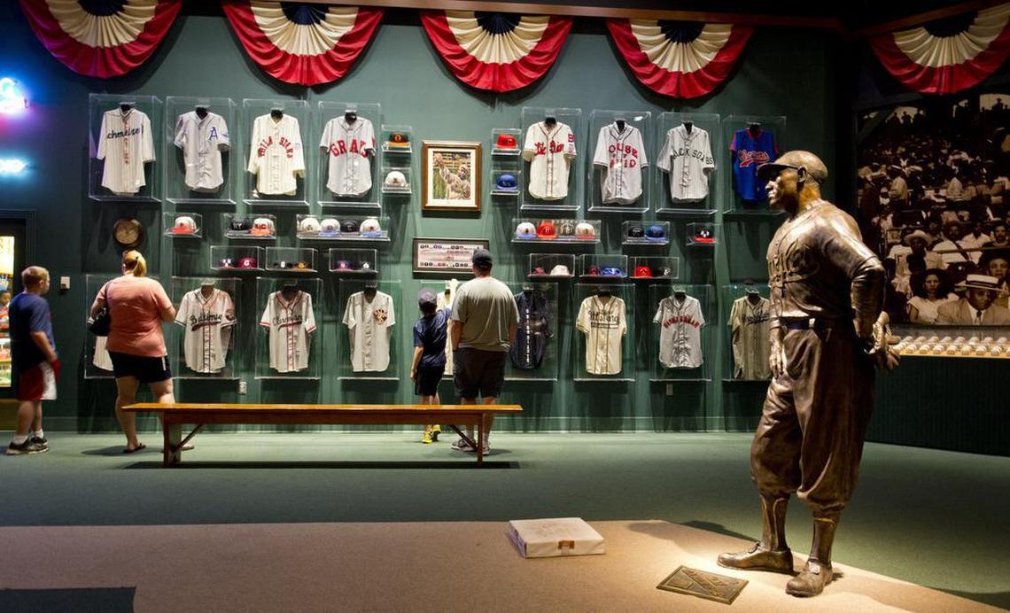 Ed and Sheri Curtin, along with their two sons Eddie, 12 and Austin, 10, toured the Negro Leagues Baseball Museum Tuesday morning. ``It’s really amazing, and a good way to teach them (sons) the history,’’ Sheri said. The family, from Tucson, Arizona, are all Boston Red Sox fans RICH SUGG/The Kansas City Star_07022013.