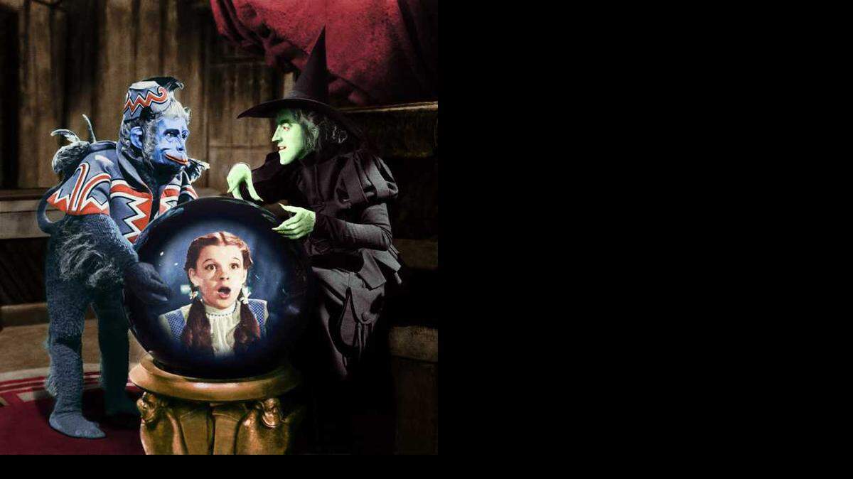 
FILE: Turner Classic Movies Film. Movie. The Wizard of Oz. Flying monkey. Wicked Witch. Dorothy in magic ball. 
