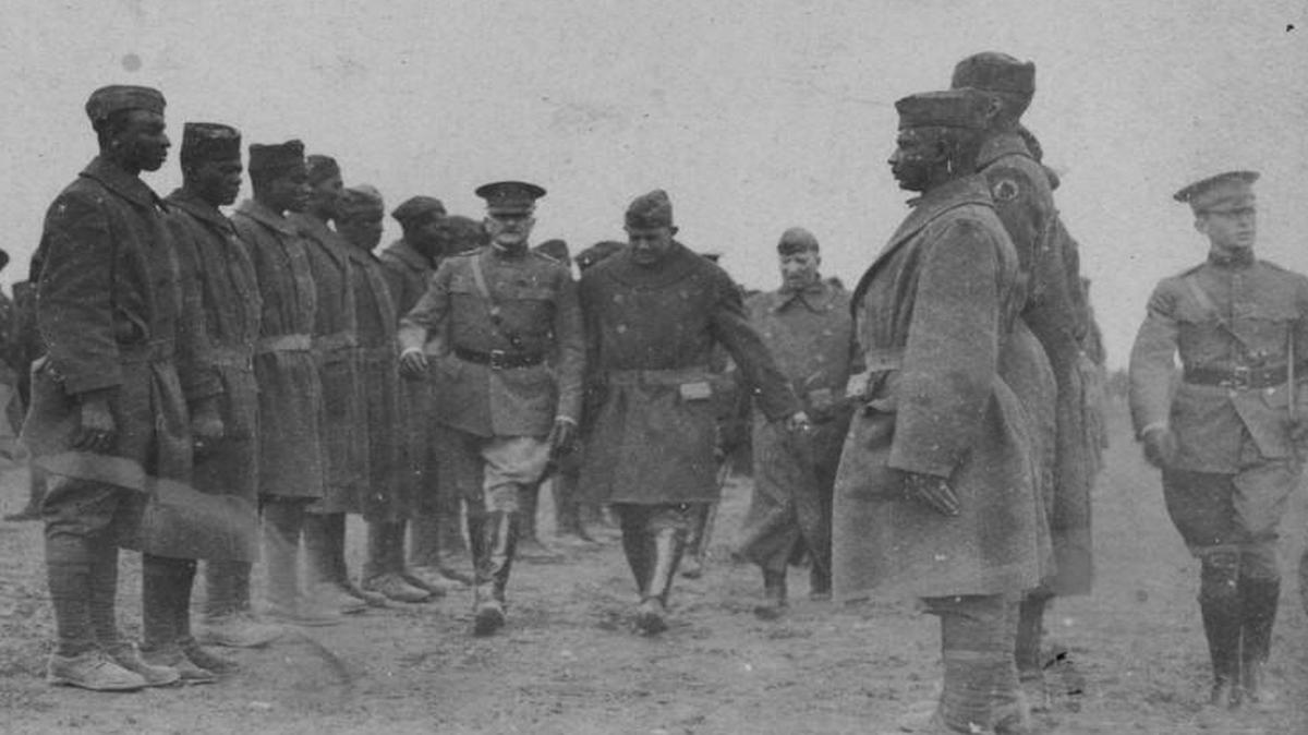 Gen. John J. Pershing reviews African-American troops at Is-Sur-Tille in France. The photo is part of “Make Way for Democracy,” an online-only exhibit of 100 photos that recognize African-Americans’ contributions in World War I.