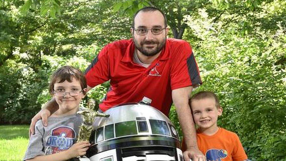 
After watching “Star Wars” together with his sons, Alex (left), 7, and Zach, 5, George Westwater of Lenexa decided to build an R2-type droid with them. 
