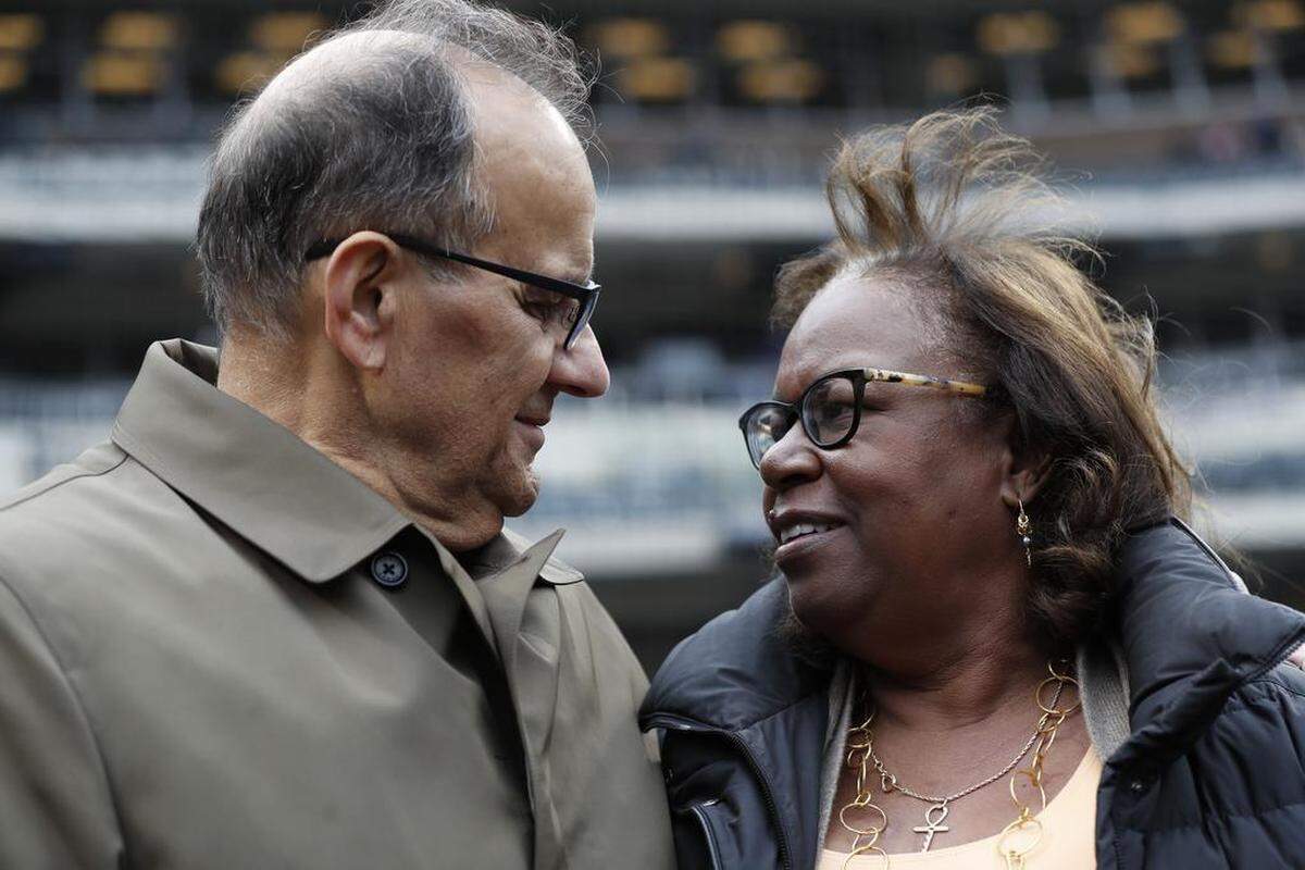 Joe Torre, left, Major League Baseball’s chief baseball officer, talks with Sharon Robinson, daughter of Jackie Robinson, before a baseball game between the New York Mets and the Milwaukee Brewers on Jackie Robinson Day, Sunday, April 15, 2018, in New York.