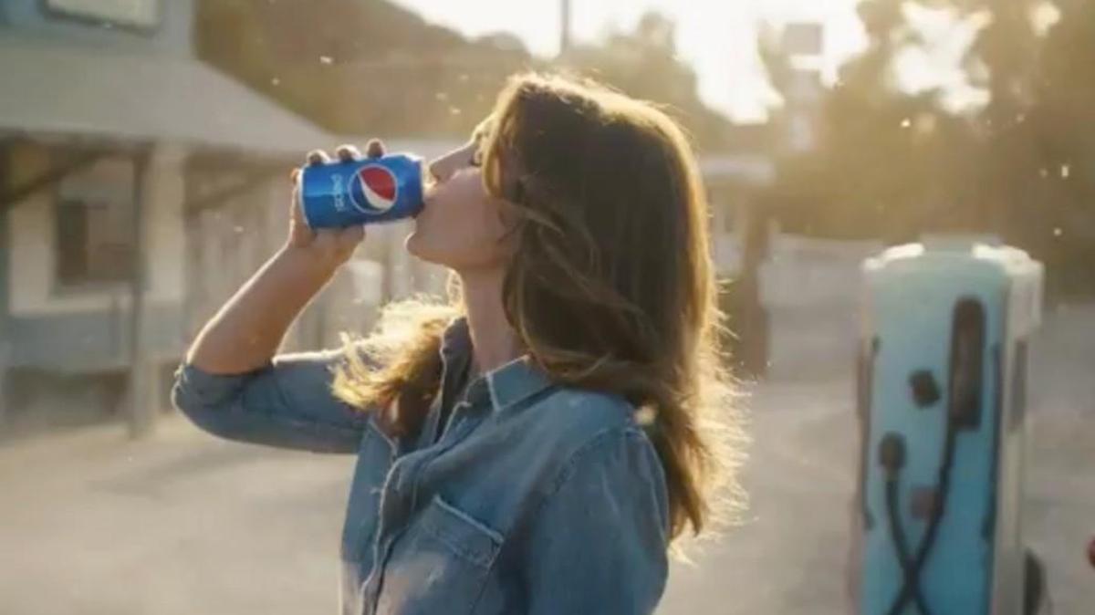 It’s been more than 20 years since Cindy Crawford starred in that iconic Super Bowl commercial for Pepsi. She stars in a new commercial for Pepsi this year, this time with her teenage son.