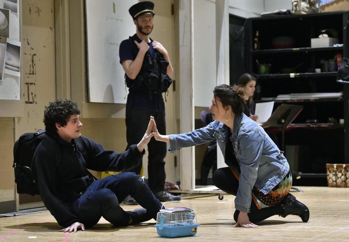 Jamie Sanders, who is making his professional stage debut in the Kansas City Repertory Theatre’s production of “The Curious Incident of the Dog in the Night-Time,” has Tourette’s Syndrome. Sanders (left) portrays a character with autism. Sanders rehearses a scene with Stephanie Roberts (right), who plays Judy and Andy Perkins, who is Voice Three.