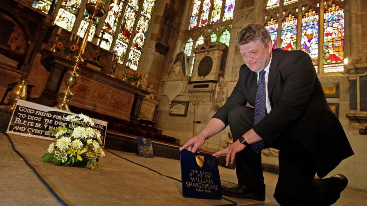 Head Verger Jon Ormrod tends to the grave of William Shakespeare in 2009 in the Chancel of Holy Trinity Church in Stratford Upon Avon, England.