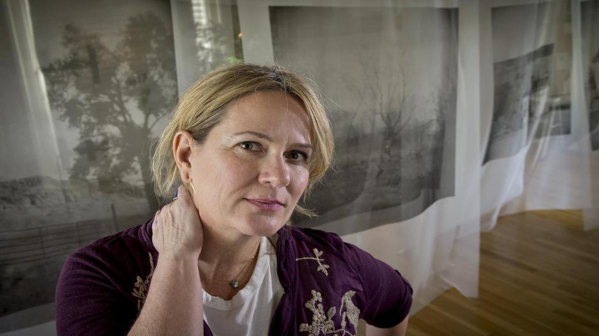 Kansas City photographer Sabrina Staires’ “Echo” project consists of 16 silk pieces with images from Picher, Okla. Once a center of lead mining, Picher is now a hazardous waste site and formally disincorporated in 2009. “Echo” opens Friday at the Leedy-Voulkos Art Center.