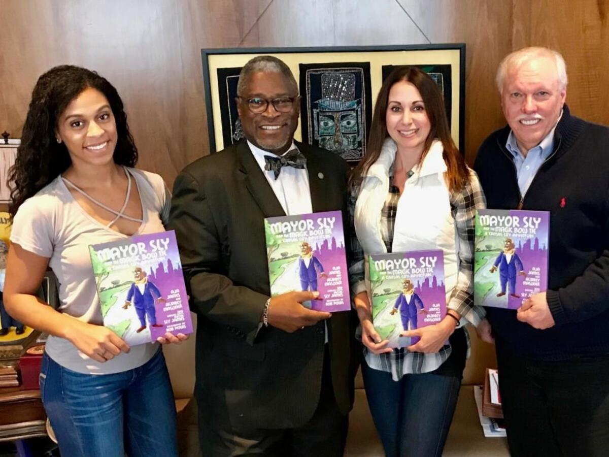 The team behind “Mayor Sly”: Aja James (left), KC Mayor Sly James, Audrey Masoner and Ascend Books publisher Bob Snodgrass.
