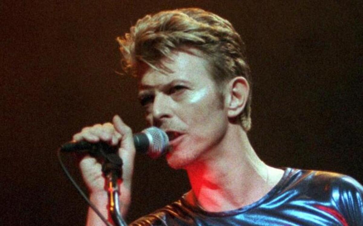 David Bowie, here performing in 1995, died in January at age 69. A new collection of interviews and conversations gives insight into Bowie the man.