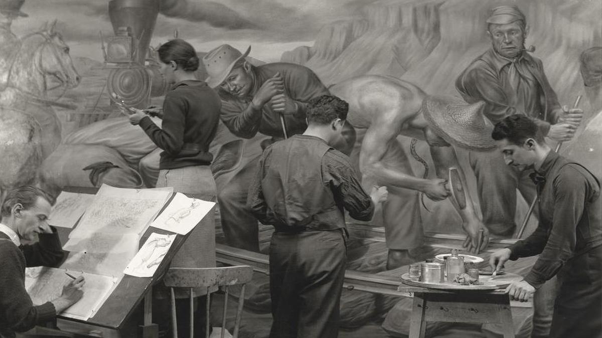 Depression-era painters hired by the Works Progress Administration were an inspiration for “The Muralist.” In this photo, Edward Laning and assistants work on a mural for Ellis Island.