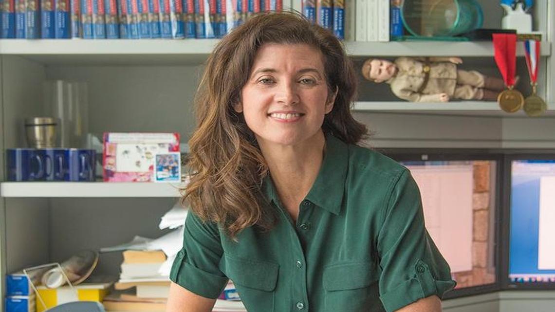 National best-selling historical author Candice Millard of Leawood works out of an office at her husband’s company in Overland Park. Mementos of past books — including a Teddy Roosevelt doll and a prestigious Edgar award, upper right — share space with research volumes and copies of her newest book, “Hero of the Empire” about Winston Churchill.