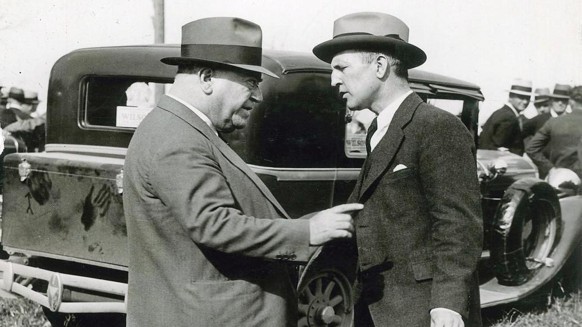 Kansas City political boss Tom Pendergast (left) and Lloyd Crow Stark talked in 1932 at a funeral in Platte City. Pendergast’s influence will be the subject of a symposium at the Plaza branch of the Kansas City Public Library.
