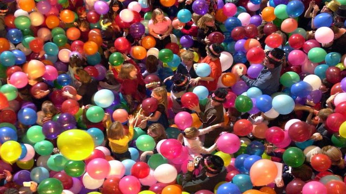 The “Noon Year’s Eve” party at Science City includes a drop of more than 2,000 balloons.