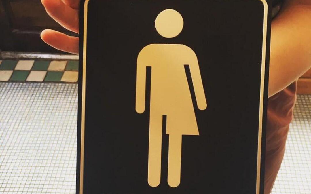 Within 24 hours of posting this picture on Facebook, Peregrine Honig’s trans-friendly bathroom sign had been shared more than 1,000 times and a company in San Francisco placed an order for one of the fully ADA-compliant signs.