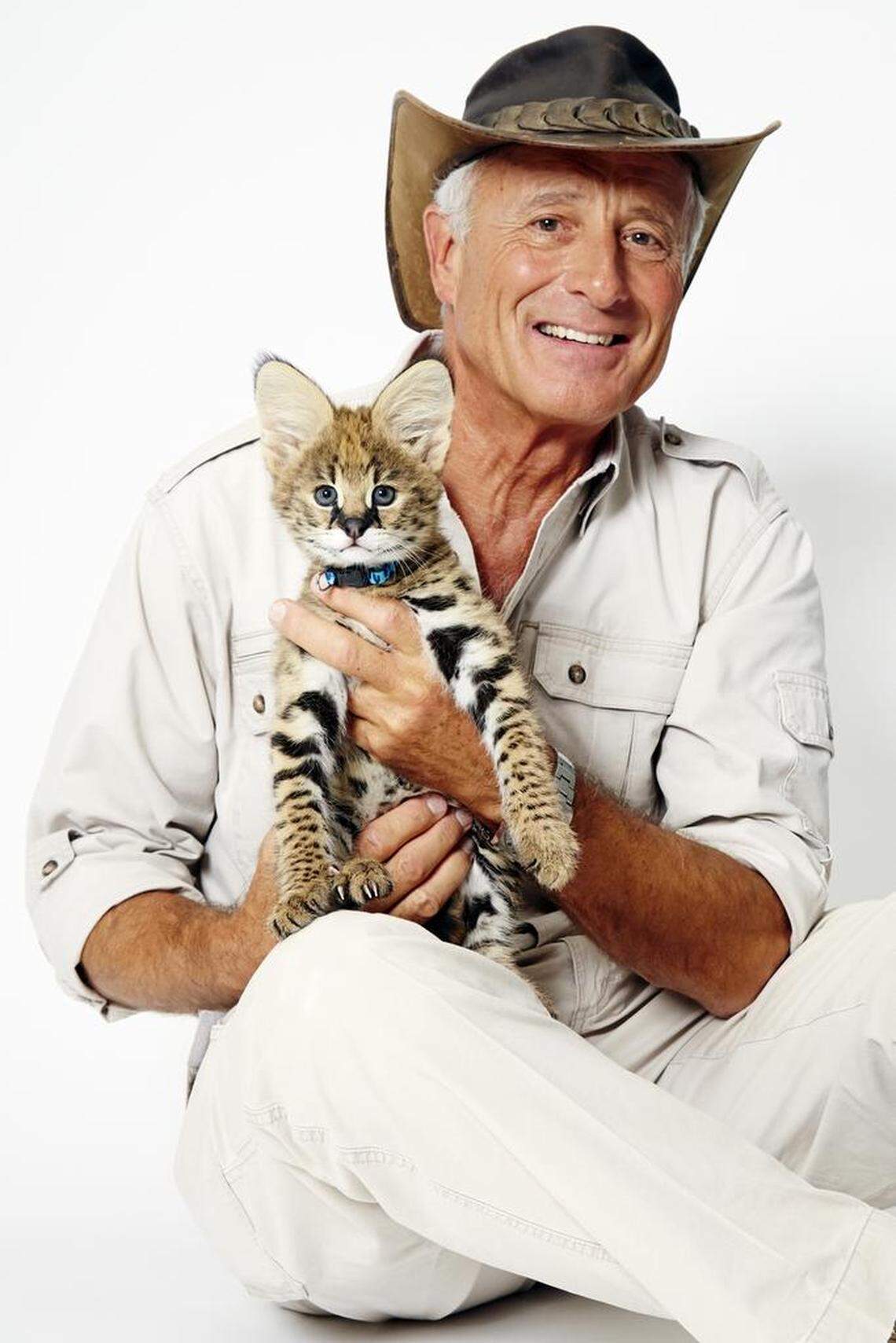 Jack Hanna with a baby serval.