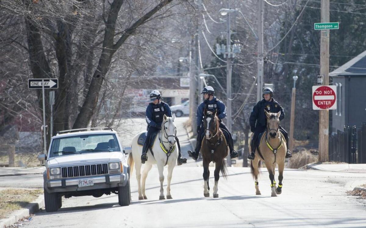 Kansas City Police specialized unit Mounted Patrol officers Mike True, (left) Brett Paulson and Joey Roberts make rounds to ensure public safety and provide community outreach.
