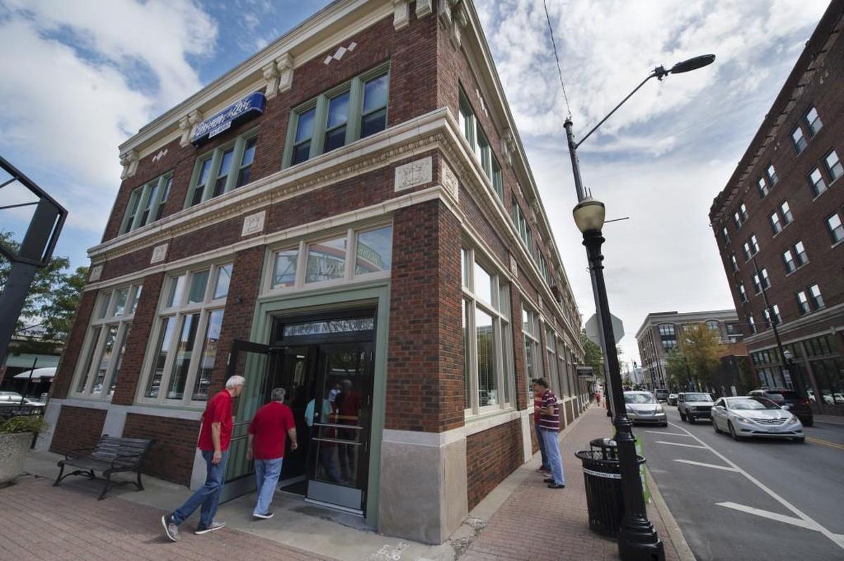 Brown & Loe is near the entrance of the City Market in a historic building that retains many original architectural details.