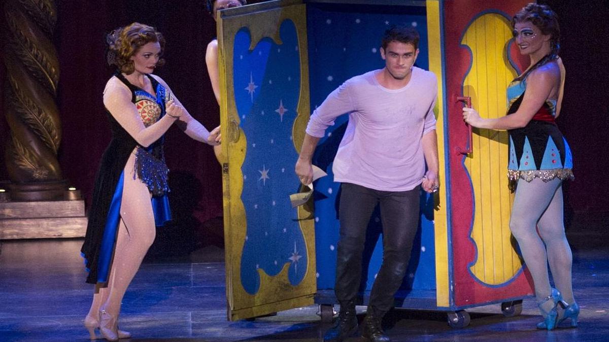 
Fastrada (left), portrayed by Sabrina Harper, held open a door as Pippin, portrayed by Sam Lips bursts through seeking an audience with his father during opening night of the national tour of "Pippin"at Starlight Theatre.
