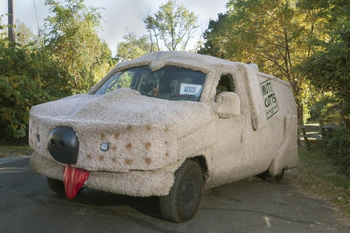 Joe Pace’s homemade “Dumb and Dumber” Shaggin’ Wagon is a 2003 Ford conversion van covered in Sam’s Club carpet.