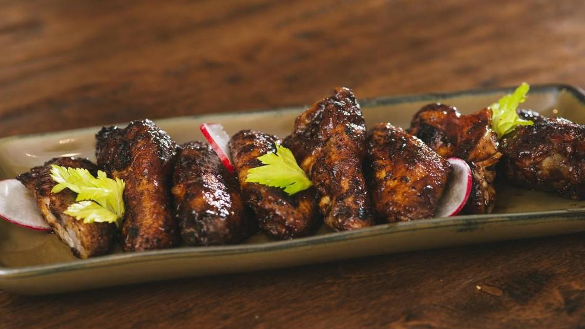 You have to try the chicken wings appetizer at Q39.