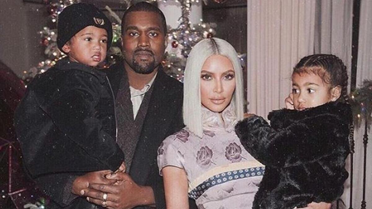 Kanye West and Kim Kardashian, with children Saint and North.