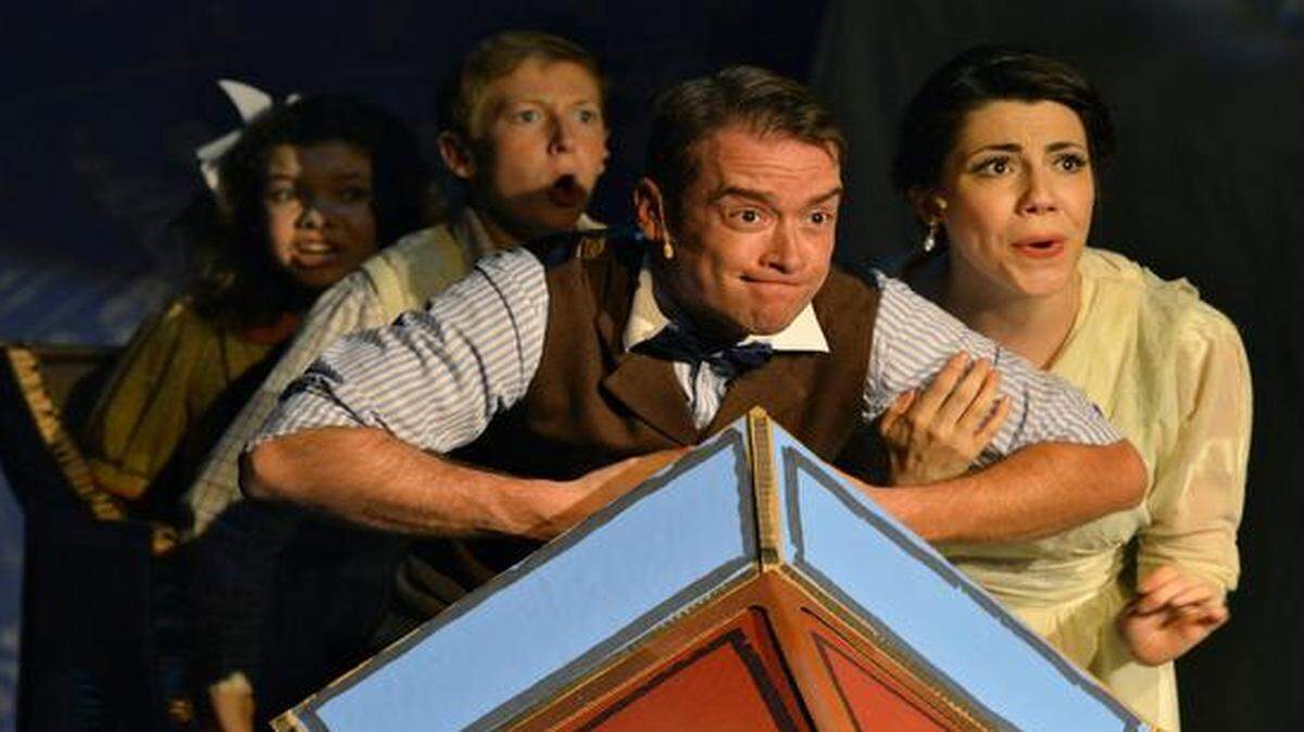 
From left, Allison Banks plays Jemima Potts with Lucas Dorrell as Jeremy Potts, Jake Walker as Caractacus Potts and Stefanie Wienecke as Truly Scrumptious in the Coterie production of “Chitty Chitty Bang Bang.”
