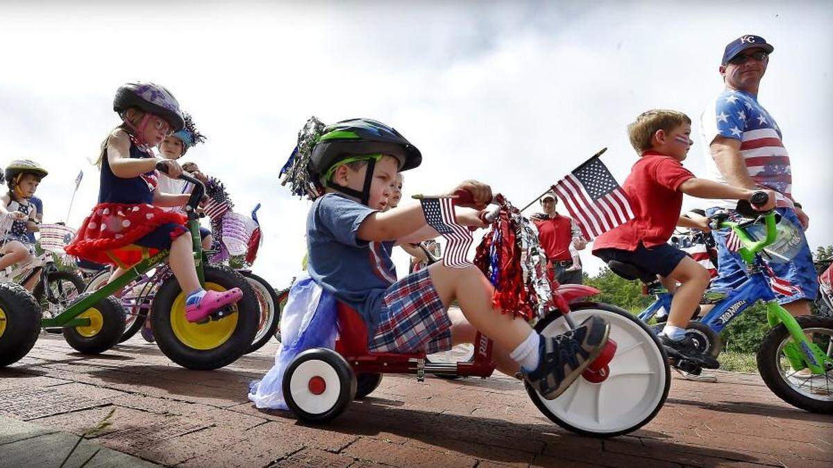 The Fourth of July evening looks like it will be dry for most of the Kansas City area. In this 2018 photo, Deanna Rose Children’s Farmstead’s celebration on July 4 includes a bike parade.