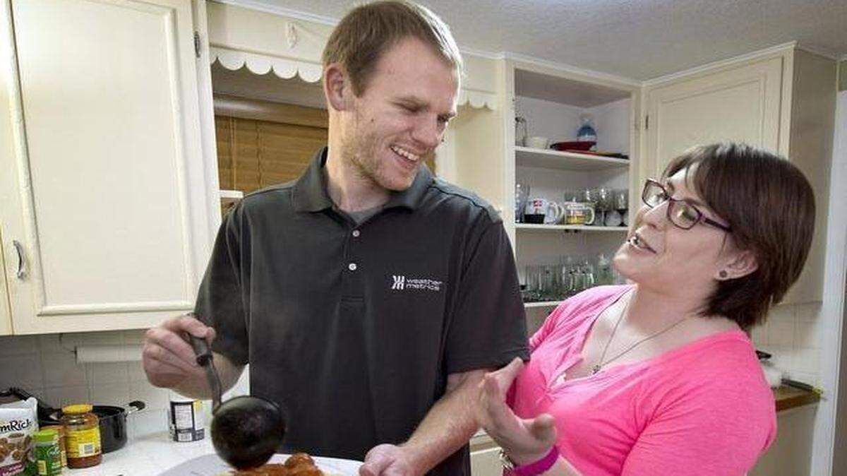 
Robyn and her boyfriend, Andrew, shared a laugh as they prepared dinner Tuesday evening at their home in the Waldo area. Robyn is a transgender cast member on a new five-part Discovery Life Channel series set to air in April.
