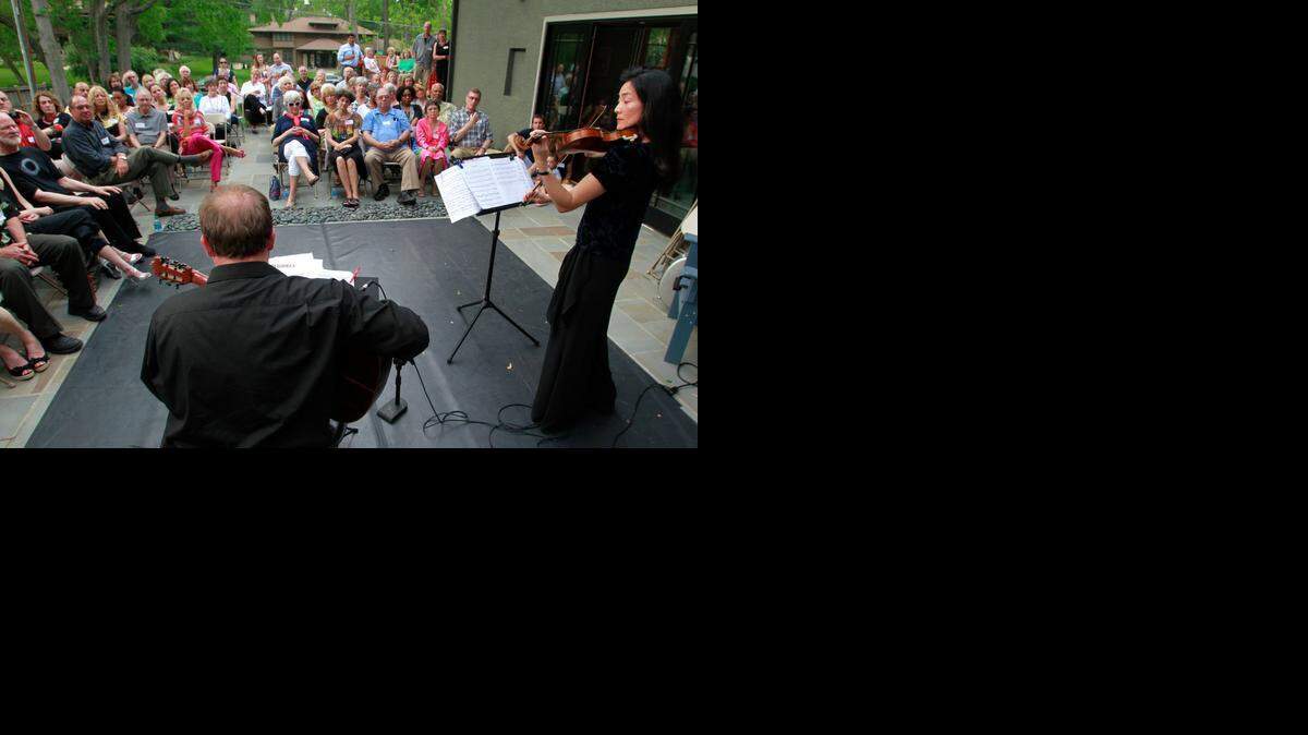 
Beau Bledsoe and Elizabeth Suh Lane of Kansas City provided the music at a midtown house concert last year as part of Arts Alive. Such efforts strive to make classical music more accessible.


