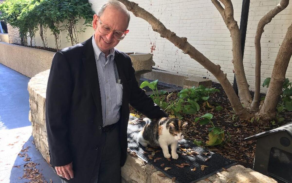 John Schaefer hopes to drop by Grace & Holy Trinity Cathedral frequently to check up on cathedral cat Grace.