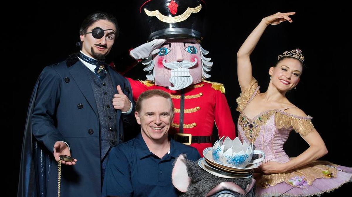 Devon Carney (seated), the artistic director for the Kansas City Ballet, is introducing a new production of the holiday classic “The Nutcracker.” Among the featured dancers will be Ryan Jolicoeur-Nye as Herr Drosselmeyer (right), Charles Martin as the Nutcracker, and Tempe Ostergren as the Sugar Plum Fairy.