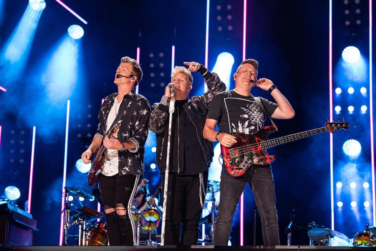 Gary LeVox, Jay DeMarcus and Joe Don Rooney of Rascal Flatts perform on stage during day 1 of 2019 CMA Music Festival on June 6, 2019 in Nashville, Tenn. (Andrew Wendowski/Imagespace/Zuma Press/TNS)