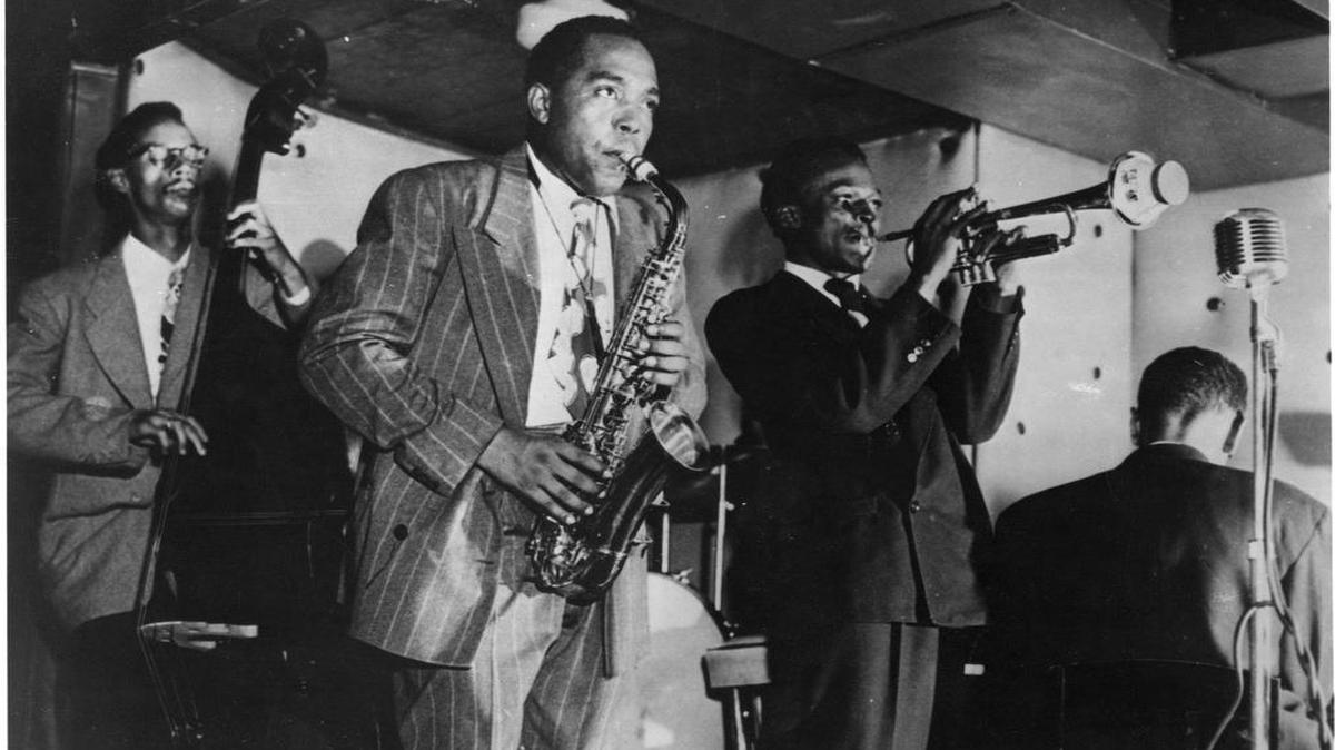 
Across Kansas City, venues will celebrate Charlie Parker’s influence on jazz. In 1948, Tommy Potter (from left), Charlie Parker, Miles Davis and Duke Jordan in 1948 at the Three Deuces club in New York City. 
