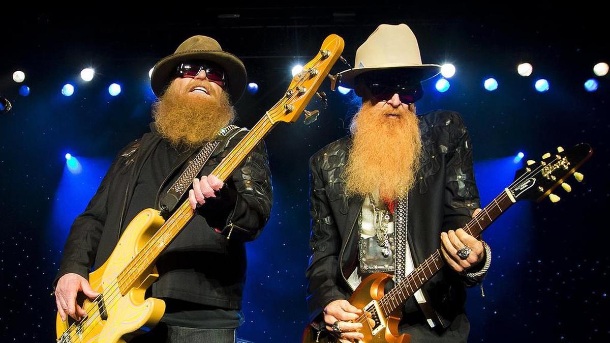 Dusty Hill, left and Billy Gibbons of ZZ Top perform at Blue Hills Bank Pavilion on Sunday, August 28, 2016 in Boston. (Photo by Winslow Townson/Invision/AP)
