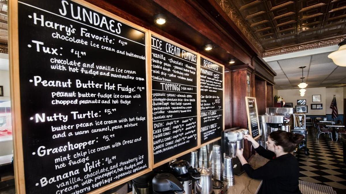 Harry Truman’s first job was at a drugstore that is now Clinton’s Soda Fountain on Independence Square. Manager Tiffany Griggs made a milkshake one recent afternoon.