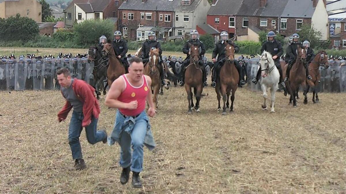Jeremy Deller’s “The Battle of Orgreave” video, part of “Making Histories” at the H&R Block Artspace, re-enacts a violent confrontation during a 1984 miners strike in Britain.