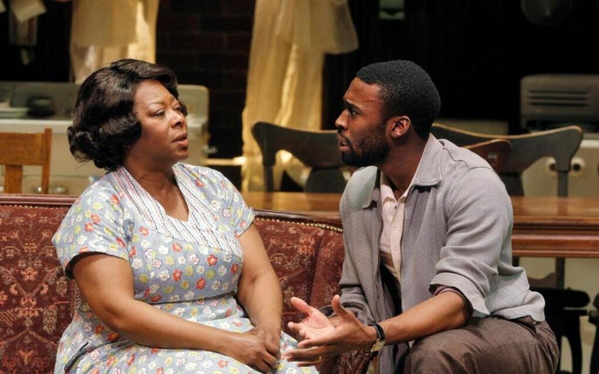 Mama (Greta Oglesby) and her son, Walter Lee (Tosin Morohunfola), have different ideas on how to use a windfall of money.