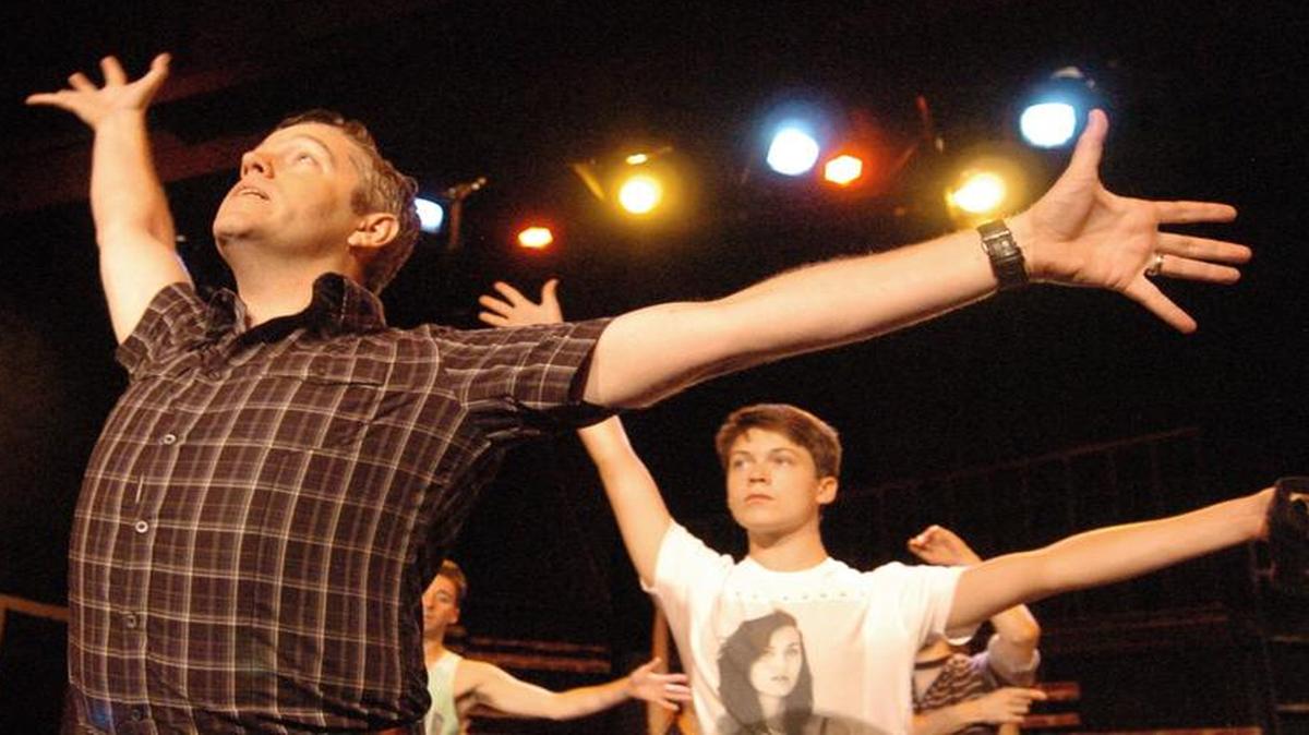 
Andy Parkhurst directs dancers portraying Jets gang members during a rehearsal for “West Side Story,” produced by Spinning Tree Theatre at the Arts Asylum. Grayman and Parkhurst are re-creating Jerome Robbins’ original choreography for this production.
