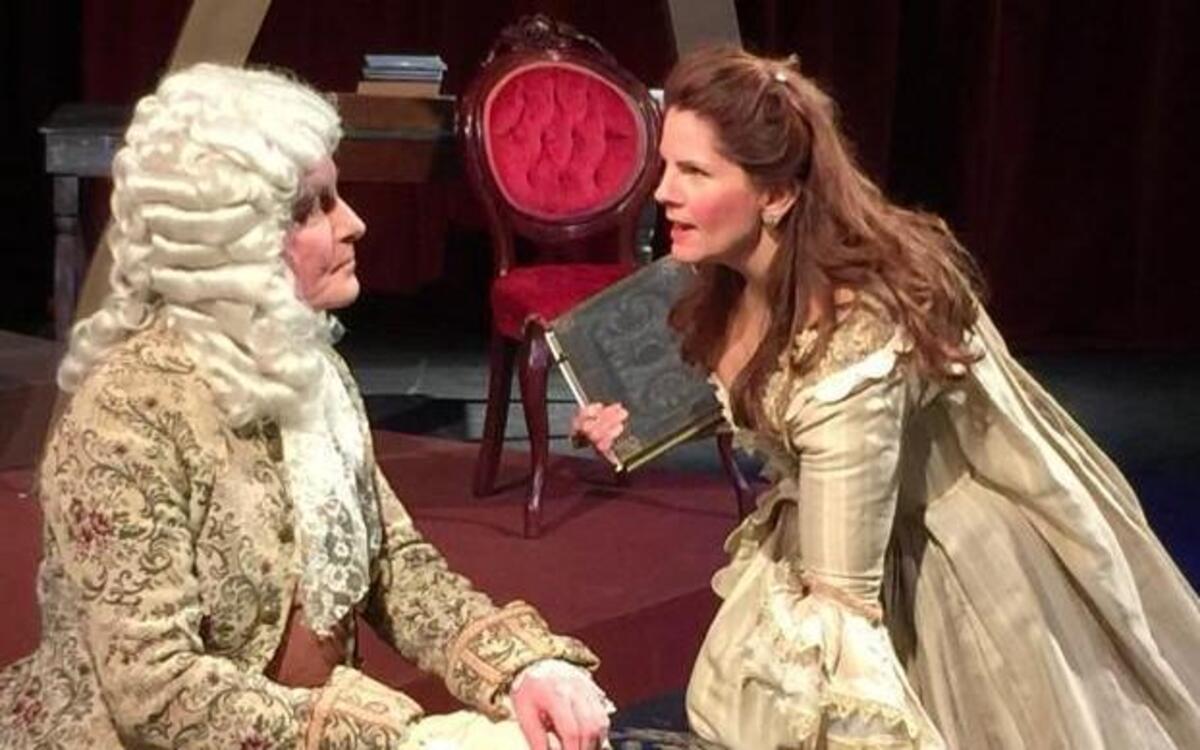 Robert Gibby Brand plays Voltaire opposite Karen Paisley, who plays the title role in “Emilie: La Marquise Du Châtelet Defends Her Life Tonight.”